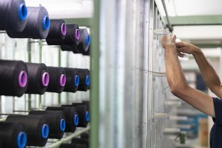 Dans l'industrie textile en Suisse, il est extrêmement difficile de recruter du personnel qualifié, a indiqué le président de Swiss Textiles Carl Illi (photo d'illustration).